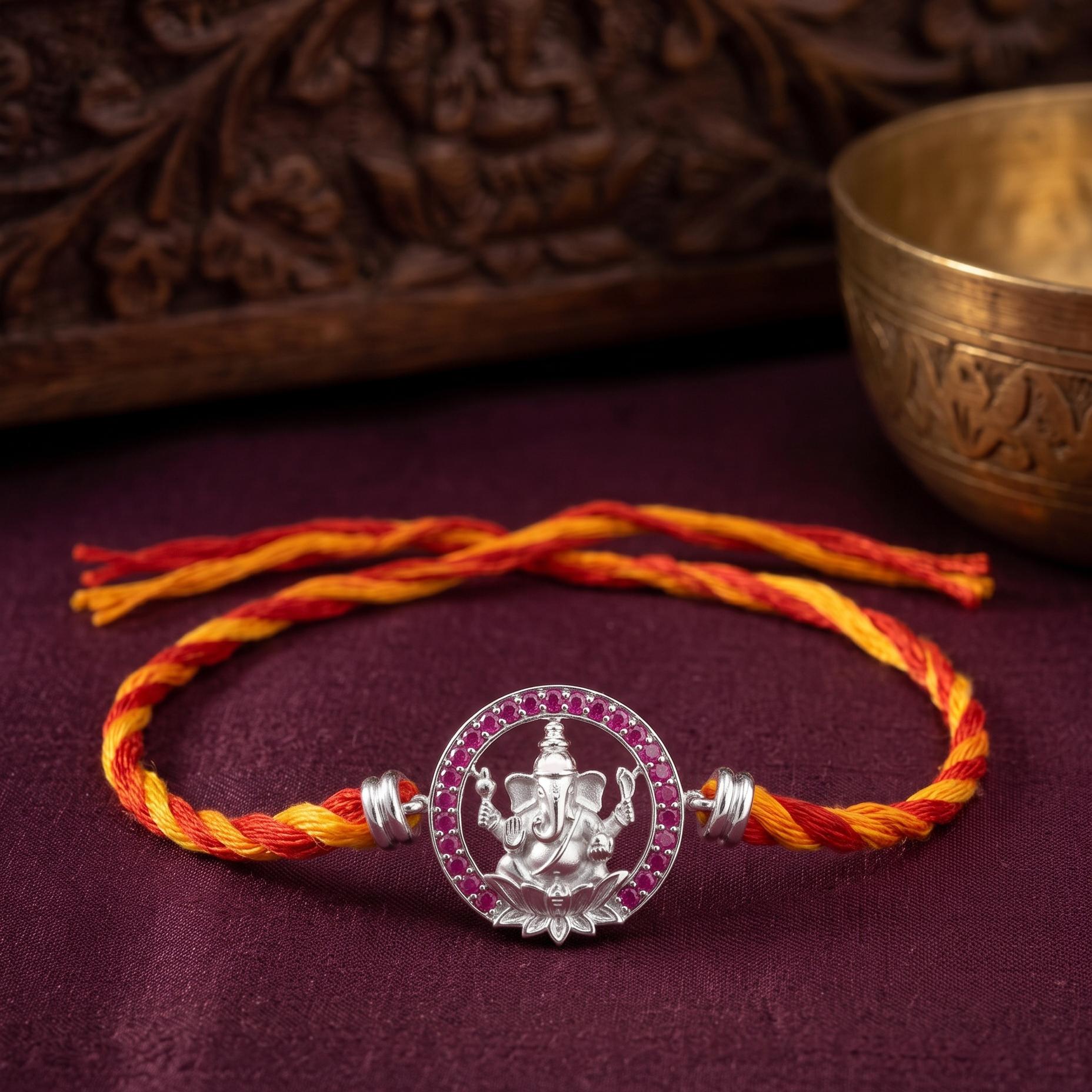 Divine Ganesha Ruby CZ Silver Rakhi ,