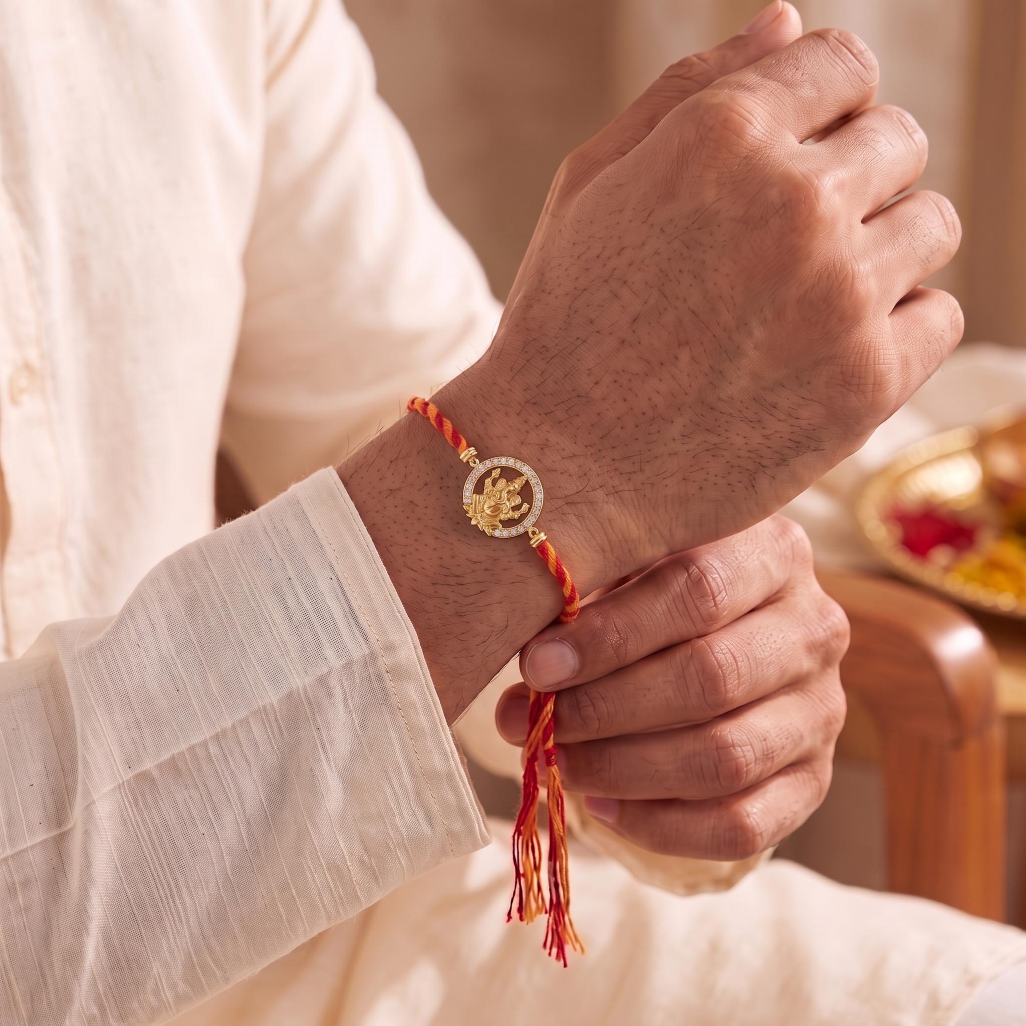 Divine Ganesha Gold-Plated Silver Rakhi ,
